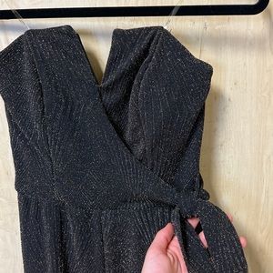 Black and gold elegant  jumpsuit. Skinny fit, sleeveless.